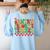 Santas Favorite Teacher Retro Groovy Christmas Xmas Women Women's Sweatshirt Back Print Light Blue