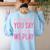 The More You Say The Less We Play PE Teacher Women's Sweatshirt Back Print Light Blue