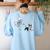 Skeleton Chasing Dog Boston Terrier Halloween Pet Lover Women's Sweatshirt Back Print Light Blue