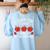 I Teach The Cutest Apples In The Orchard Cute Fall Teacher Women's Sweatshirt Back Print Light Blue
