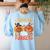I Teach The Cutest Little Turkeys Teacher Thanksgiving Women's Sweatshirt Back Print Light Blue
