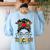 Teacher Life Messy Bun Glasses Leopard Sunflower Women's Sweatshirt Back Print Light Blue