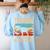 Teaching Is a Walk In Park Dinosaur Teacher Women's Sweatshirt Back Print Light Blue
