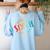 Team Sixth Grade Teacher Student Back To School 6th Grade Women's Sweatshirt Back Print Light Blue