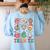 Team TK Teacher Christmas Groovy Smile Face Girl Boy Kid TK Women's Sweatshirt Back Print Light Blue Team TK Teacher Christmas Groovy Smile Face Girl Boy Kid TK Women's Sweatshirt Back Print Light Blue