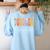 Toddler Teacher Retro Groovy Women Happy First Day Of School Women's Sweatshirt Back Print Light Blue