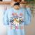 Trick Or Teach Groovy Teacher Halloween Retro Floral Ghost Women's Sweatshirt Back Print Light Blue