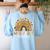 Wild About Reading Teacher Back To School Leopard Rainbow Women's Sweatshirt Back Print Light Blue