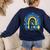 Be Kind Rainbow Down Syndrome Awareness Teacher Blue Yellow Women's Sweatshirt Back Print Navy