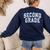 Second Grade Floral Blue Back To School 2nd Grade Teacher Women's Sweatshirt Back Print Navy
