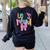 Lets Read Reading Teacher Back To School Literacy Pencil Bow Women's Sweatshirt Back Print Black Lets Read Reading Teacher Back To School Literacy Pencil Bow Women's Sweatshirt Back Print Black