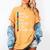Educar Bilingual Spanish Teacher Women's Comfort Colors T-Shirt Mustard Educar Bilingual Spanish Teacher Women's Comfort Colors T-Shirt Mustard