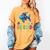 Happy First Day Of School Fish Rainbows Teacher Be Kind Women's Comfort Colors T-Shirt Mustard Happy First Day Of School Fish Rainbows Teacher Be Kind Women's Comfort Colors T-Shirt Mustard