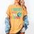 Multilingual Teacher In Dos Idiomas Linguist Language Women's Comfort Colors T-Shirt Mustard Multilingual Teacher In Dos Idiomas Linguist Language Women's Comfort Colors T-Shirt Mustard