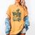 Skeleton Book Floral Skull Halloween Teacher Costume Women's Comfort Colors T-Shirt Mustard Skeleton Book Floral Skull Halloween Teacher Costume Women's Comfort Colors T-Shirt Mustard