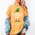 The Teacher Elf Matching Family Christmas Women's Comfort Colors T-Shirt Mustard The Teacher Elf Matching Family Christmas Women's Comfort Colors T-Shirt Mustard