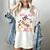 Retro Floral Ghost Trick Or Teach Groovy Teacher Halloween Women's Comfort Colors T-Shirt Ivory Retro Floral Ghost Trick Or Teach Groovy Teacher Halloween Women's Comfort Colors T-Shirt Ivory