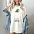 The Teacher Elf Matching Family Christmas Women's Comfort Colors T-Shirt Ivory The Teacher Elf Matching Family Christmas Women's Comfort Colors T-Shirt Ivory