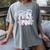 First Grade Coquette Bow Girls Teacher Team 1st Grade Squad Women's Comfort Colors T-Shirt Gray First Grade Coquette Bow Girls Teacher Team 1st Grade Squad Women's Comfort Colors T-Shirt Gray