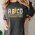 ABCD Kindergarten Rocks Pencil Lightning Students Teachers Women's Comfort Colors T-Shirt Pepper ABCD Kindergarten Rocks Pencil Lightning Students Teachers Women's Comfort Colors T-Shirt Pepper