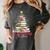 All Booked For Christmas Xmas Tree Teacher Holiday Pajamas Women's Comfort Colors T-Shirt Pepper