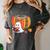 Fall Book Pumpkin Ghost Reading Books Halloween Teacher Women's Comfort Colors T-Shirt Pepper
