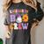 Kindergarten Boo Crew Spooky Kindergarten Halloween Teacher Women's Comfort Colors T-Shirt Pepper