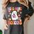 Read More Books Groovy Halloween Teacher Women Women's Comfort Colors T-Shirt Pepper