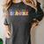 Se Amable Be Kind In Spanish Groovy Teacher Flowers Women's Comfort Colors T-Shirt Pepper