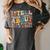 I Tell Young People About Dead People Groovy History Teacher Women's Comfort Colors T-Shirt Pepper I Tell Young People About Dead People Groovy History Teacher Women's Comfort Colors T-Shirt Pepper