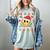Santas Favorite Teacher Retro Groovy Smile Face Christmas Women's Comfort Colors T-Shirt Bay Santas Favorite Teacher Retro Groovy Smile Face Christmas Women's Comfort Colors T-Shirt Bay