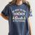 Christmas Be Nice To The Teacher Santa Is Watching Xmas Women's Comfort Colors T-Shirt Denim Christmas Be Nice To The Teacher Santa Is Watching Xmas Women's Comfort Colors T-Shirt Denim