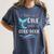 Cute Mermaid Librarian Teacher Dive Into A Good Book Reading Women's Comfort Colors T-Shirt Denim