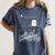 Read In Peace Skeleton Halloween Book Reading Spooky Teacher Women's Comfort Colors T-Shirt Denim