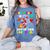 2nd Grade Is Out Of This World Space Rocket Planets Teacher Women's Comfort Colors T-Shirt Blue Jean