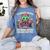 Halloween Teacher Zombie Reading Is Good For Brains Women's Comfort Colors T-Shirt Blue Jean