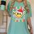 Santas Favorite Teacher Retro Groovy Smile Face Christmas Women's Comfort Colors T-Shirt Chalky Mint Santas Favorite Teacher Retro Groovy Smile Face Christmas Women's Comfort Colors T-Shirt Chalky Mint