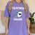 Teacher Shark Teaching Back To School Kindergarten Women's Comfort Colors T-Shirt Violet Teacher Shark Teaching Back To School Kindergarten Women's Comfort Colors T-Shirt Violet