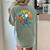 Boston Terrier Dog Riding Dinosaur T Rex Boys Women's Comfort Colors T-Shirt Back Print Bay