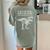 Lets Eat Kids Punctuation Saves Lives Dinosaur Teacher Women's Comfort Colors T-Shirt Back Print Bay