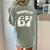 Haunted By 67 Teacher Halloween 6 7 Shirt Women's Comfort Colors T-Shirt Back Print Bay