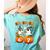 Haunted By 67 Boo Ghost Pumpkin Halloween Teacher Women's Comfort Colors T-Shirt Back Print Chalky Mint