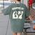 Haunted By 67 Teacher Halloween 6 7 Shirt Women's Comfort Colors T-Shirt Back Print Moss