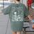 Read In Peace Skeleton Reading Teacher Spooky Halloween Women's Comfort Colors T-Shirt Back Print Moss
