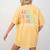 Kids AUTISM IS NOT A TRAGEDY IGNORANCE IS Proud Teacher Crew Women's Comfort Colors T-Shirt Back Print Mustard