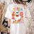 Groovy Halloween Trick Or Teach Retro Floral Ghost Teacher For Men Women Kids Women's Comfort Colors T-Shirt Back Print Ivory