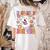 Read More Books Groovy Halloween Teacher Women Women's Comfort Colors T-Shirt Back Print Ivory