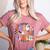 Trick Or Teach Retro Groovy Halloween Teacher Women's Heather T-Shirt Heather Mauve Trick Or Teach Retro Groovy Halloween Teacher Women's Heather T-Shirt Heather Mauve