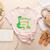 Kids My Nonna Loves Me Dinosaur Grandson Women's Heather T-Shirt Heather Peach