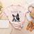 Love Is Boston Terrier Bostie Women's Heather T-Shirt Heather Peach